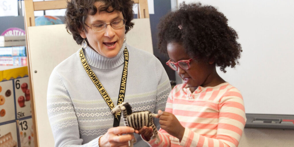 Teacher and Student with Mennonite Education Agency